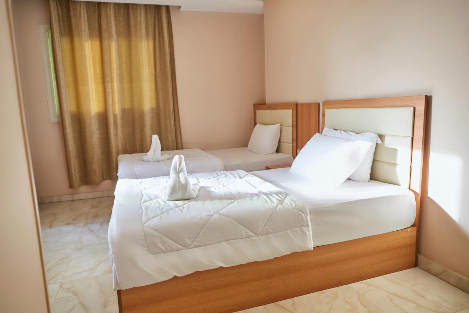 Kafret el-Gabal Grand Golden Pyramids View Hotel מראה חיצוני תמונה