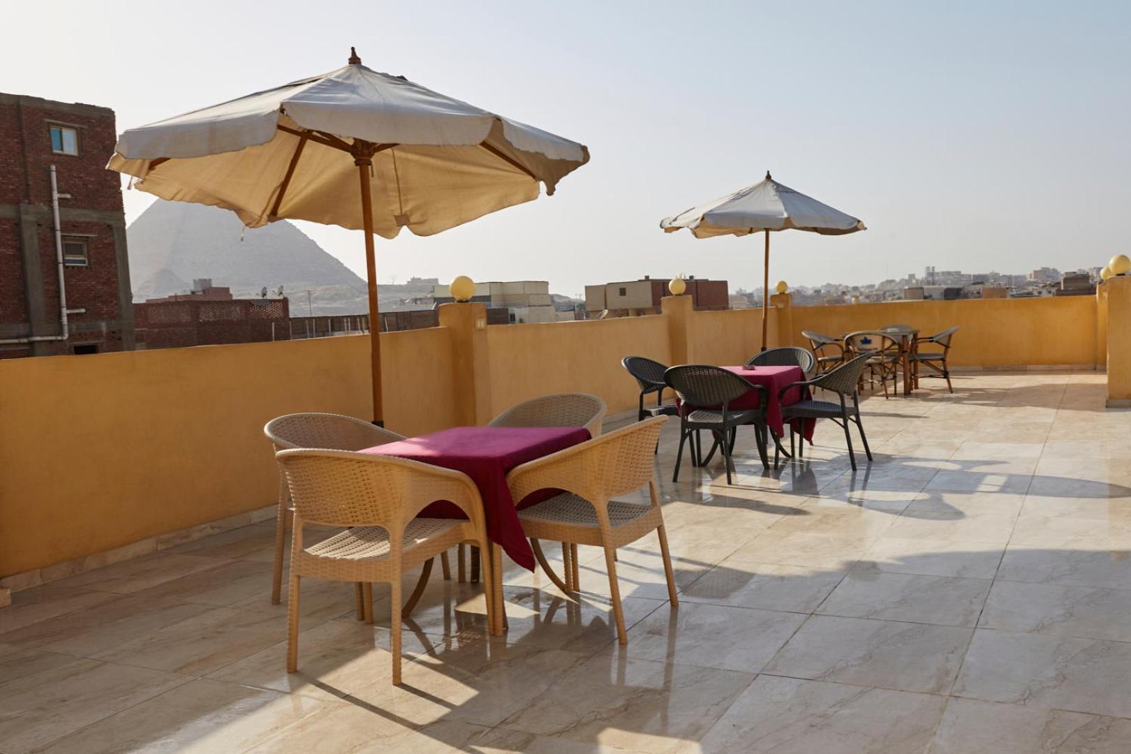 Kafret el-Gabal Grand Golden Pyramids View Hotel מראה חיצוני תמונה