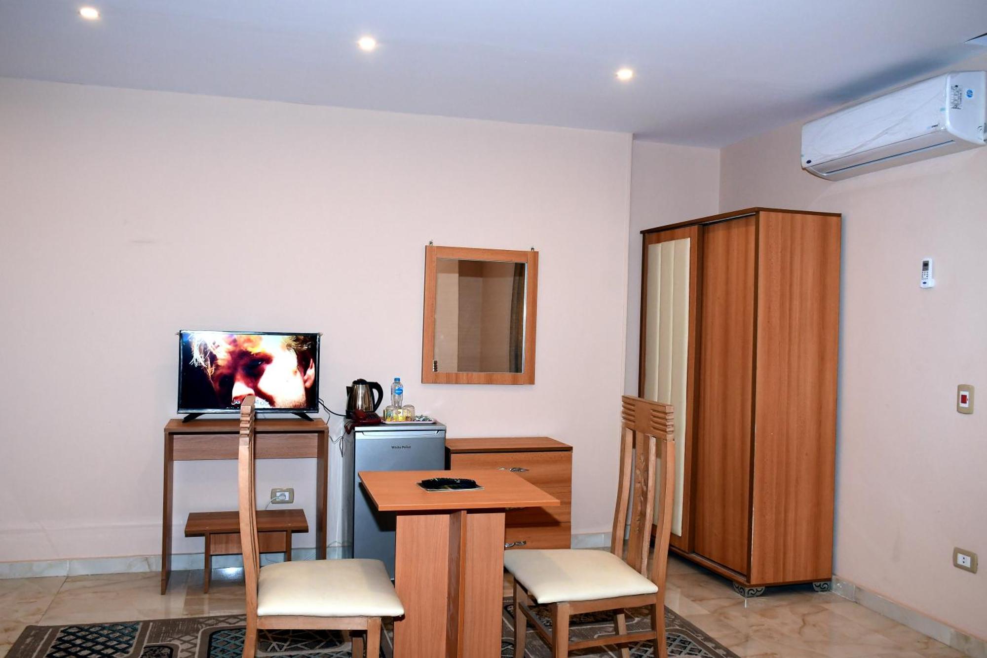 Kafret el-Gabal Grand Golden Pyramids View Hotel מראה חיצוני תמונה