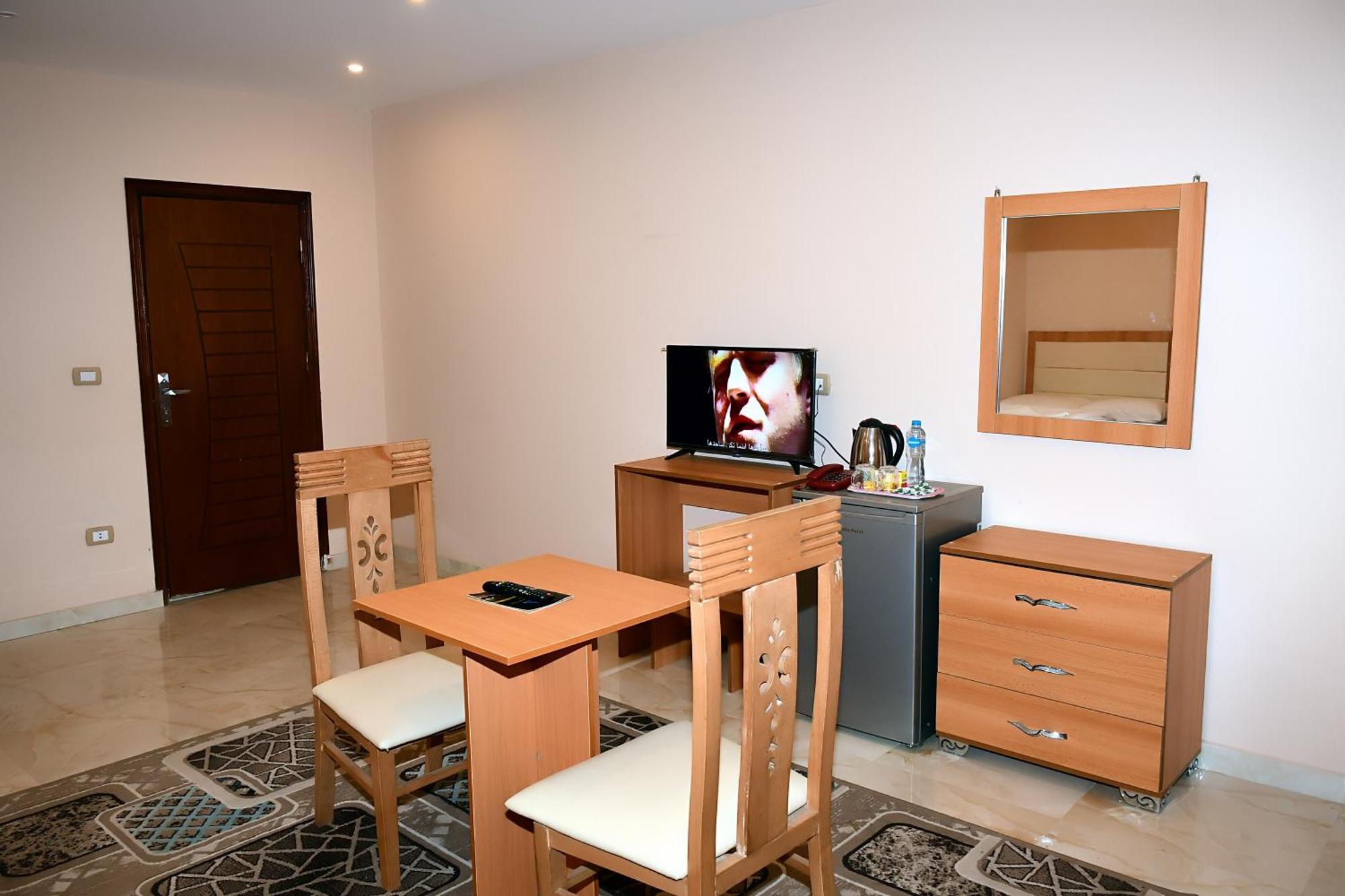 Kafret el-Gabal Grand Golden Pyramids View Hotel מראה חיצוני תמונה