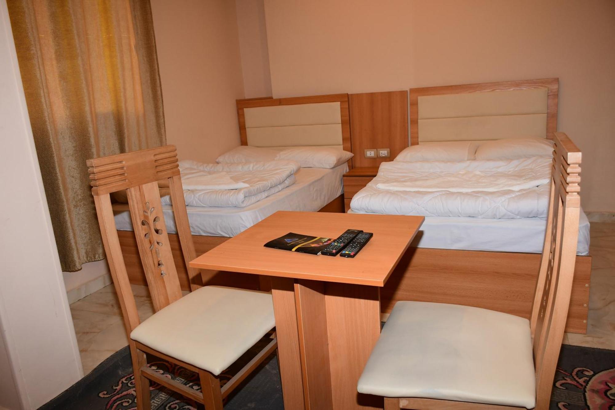 Kafret el-Gabal Grand Golden Pyramids View Hotel מראה חיצוני תמונה