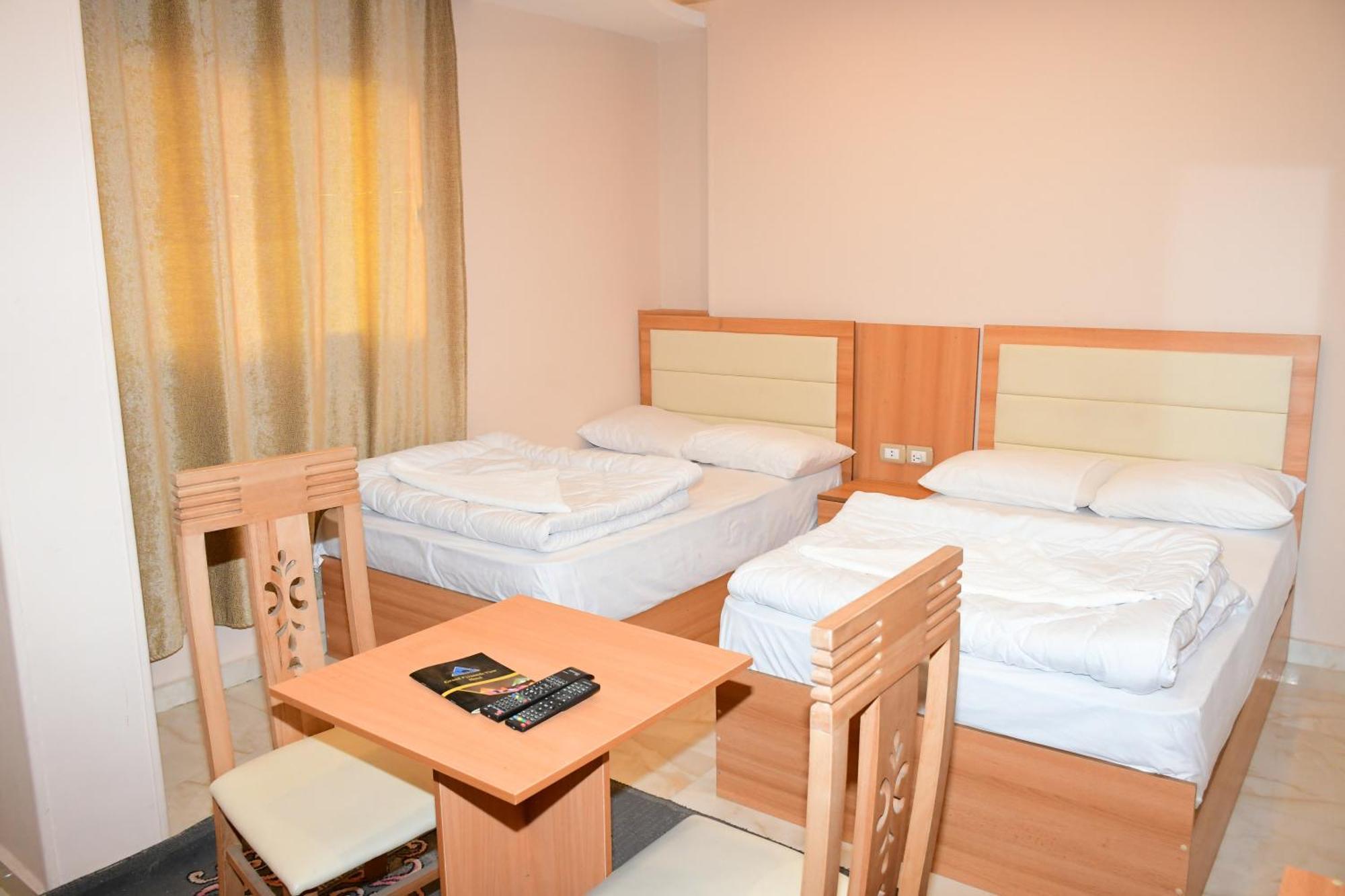 Kafret el-Gabal Grand Golden Pyramids View Hotel מראה חיצוני תמונה