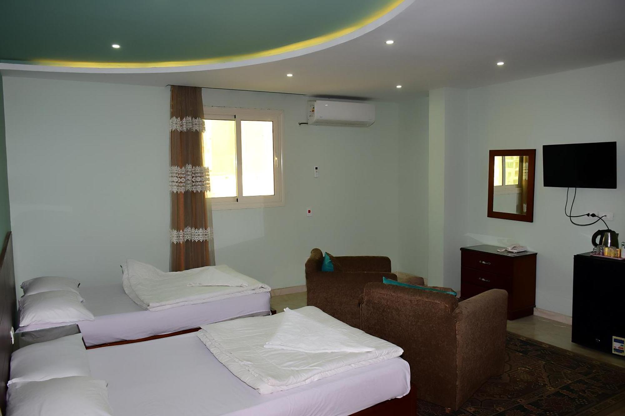 Kafret el-Gabal Grand Golden Pyramids View Hotel מראה חיצוני תמונה