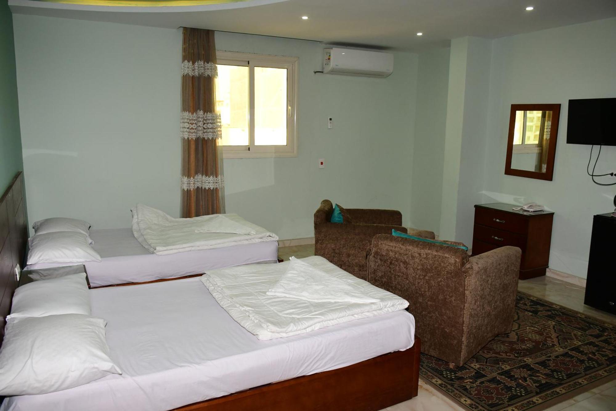 Kafret el-Gabal Grand Golden Pyramids View Hotel מראה חיצוני תמונה