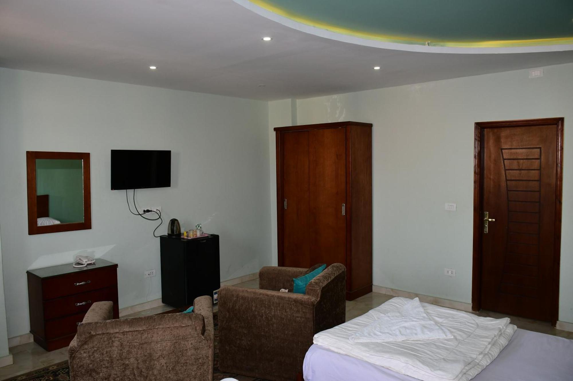 Kafret el-Gabal Grand Golden Pyramids View Hotel מראה חיצוני תמונה